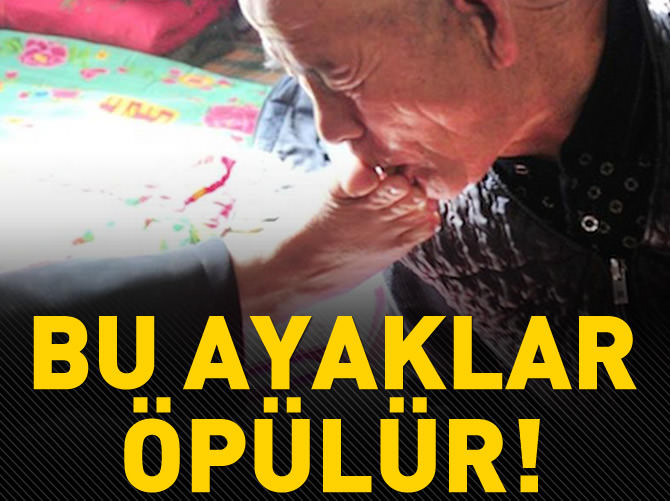 Kocasını ayağıyla tıraş ediyor