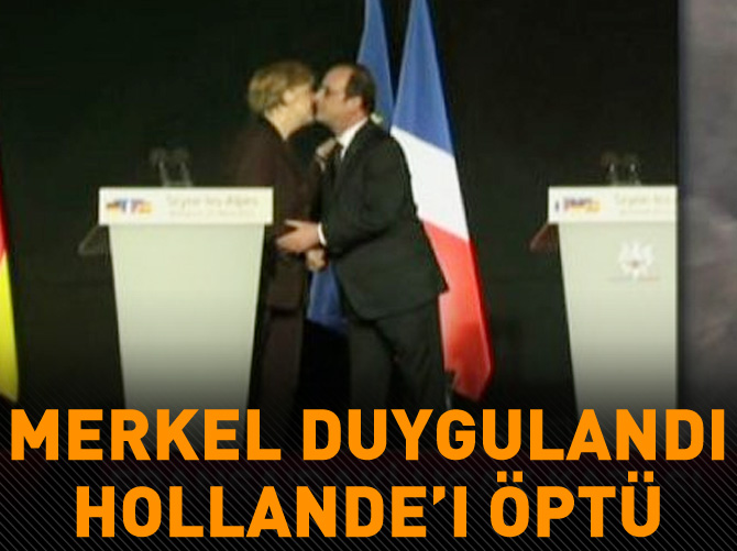 Merkel duygulandı Hollande'ı öptü