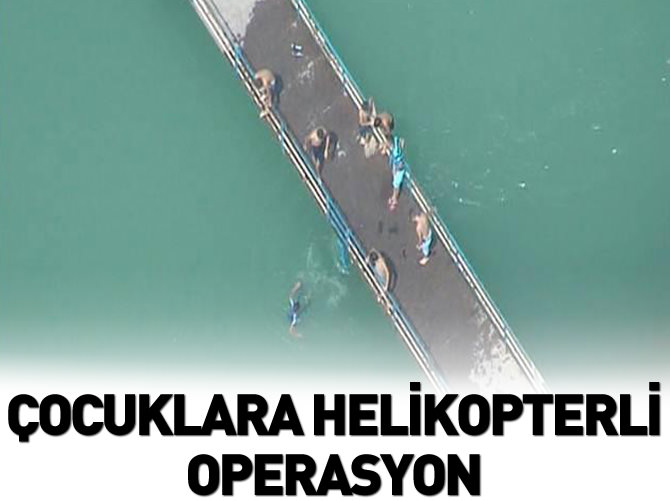 Su kanalında yüzenlere helikopterli operasyon