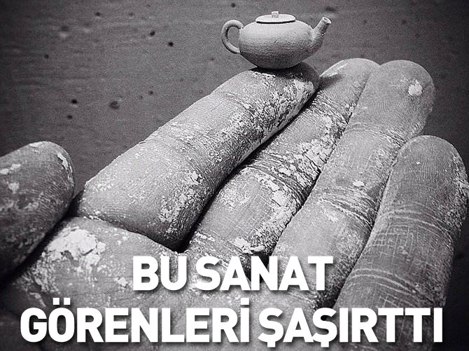 Bu sanatçı elleriyle inanılmaz küçüklükte çömlekler yapıyor.