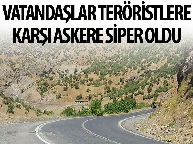 Vatandaşlar teröristlere karşı askere siper oldu
