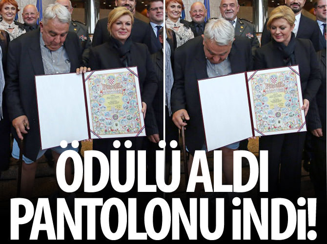 Ödülü kaldırdı pantolonu indirdi