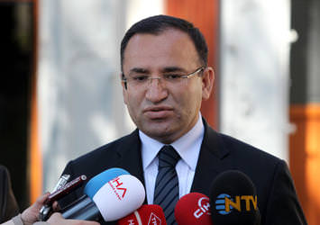 Bozdağ: Merkel'i kutluyorum