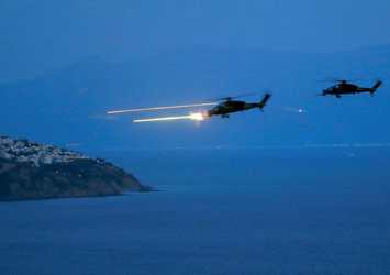 Atak helikopterinden tatbikatta ilk atış