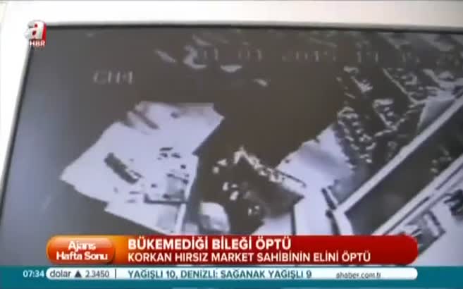 Korkan hırsız market sahibinin elini öptü