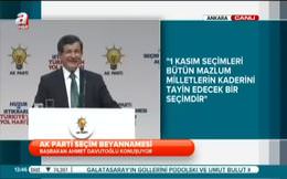 Sahneye çıkıp Davutoğlu’na sarıldı