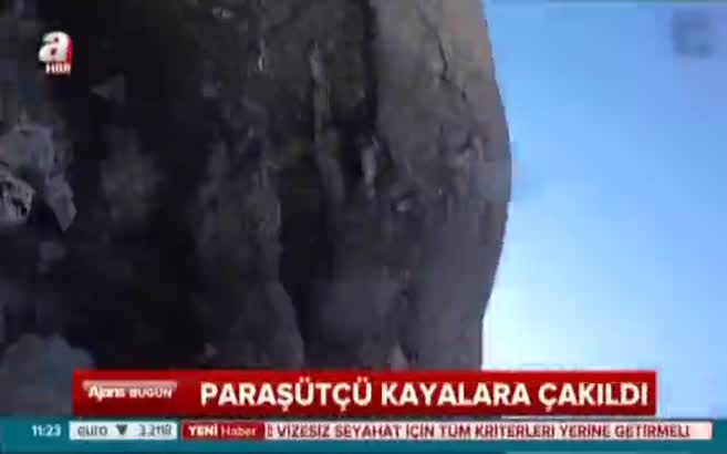 Paraşütçü kayalara çakıldı