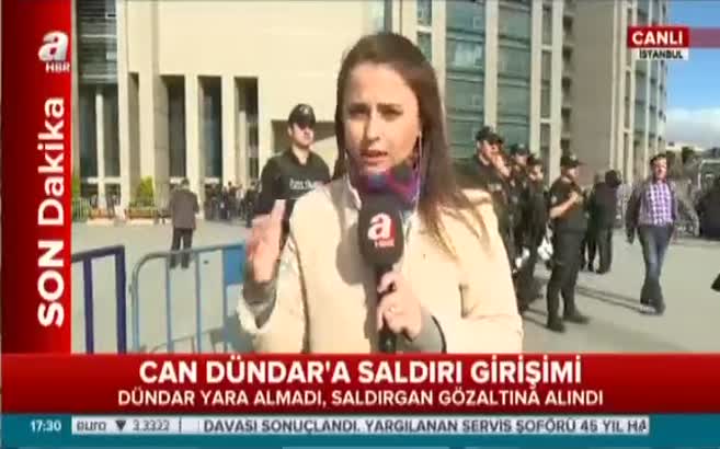 Can Dündar'a Adliye önünde ateş açıldı