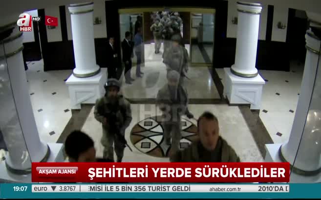 Şehitleri yerde sürüklediler