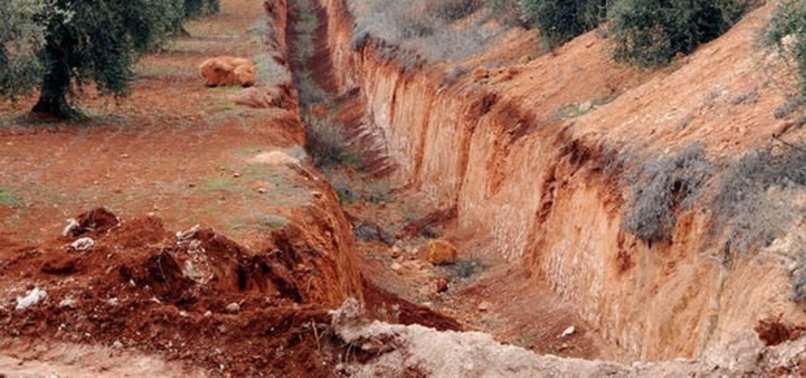 Teröristlerin Afrin'de kazdığı hendekler görüntülendi